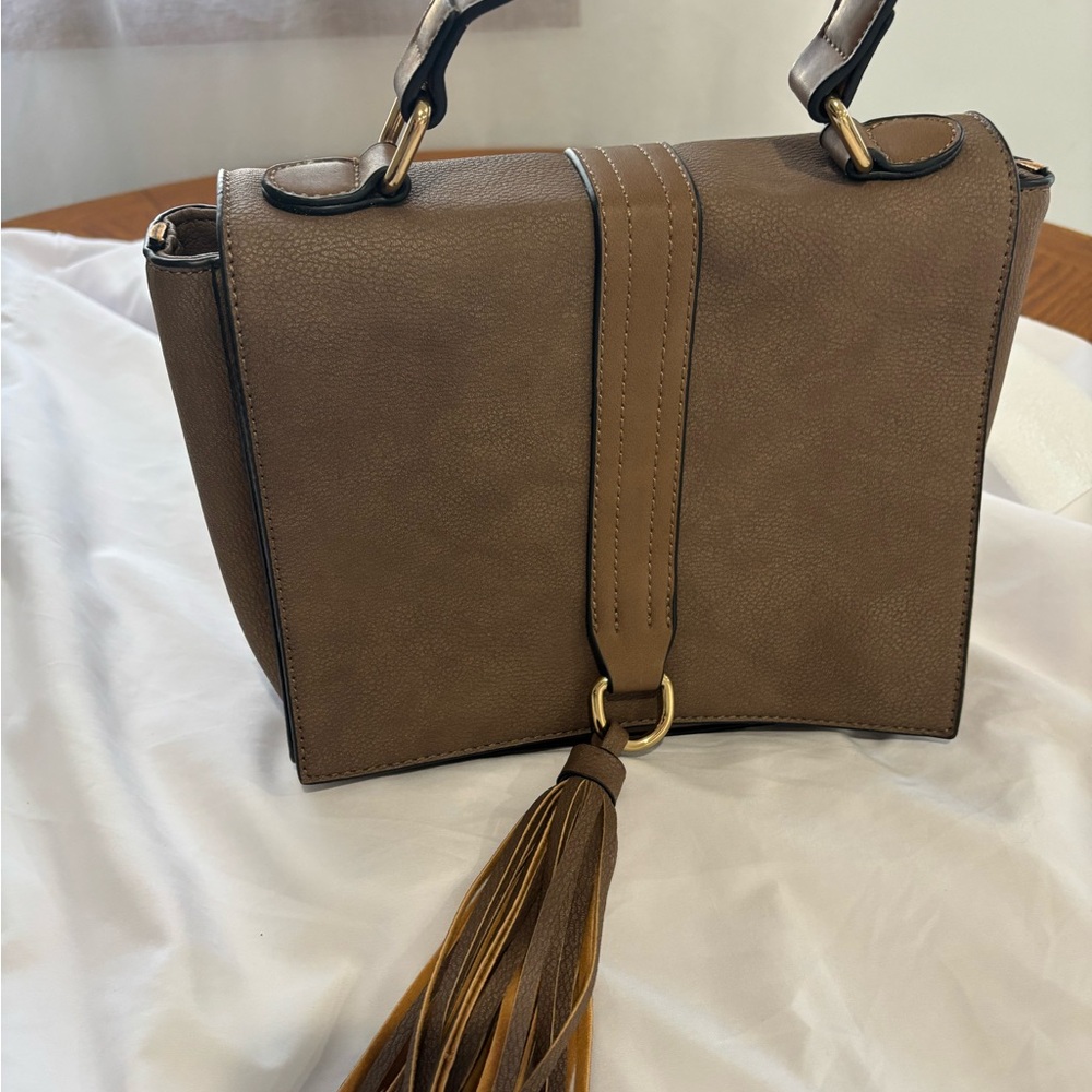 Brown Shoulder Bag with Tassel Accent and Vertical Stripe